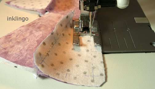 Chain sew by machine.