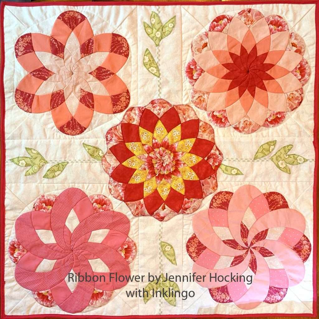 Ribbon Flower Baby Quilt by Jennifer Hocking