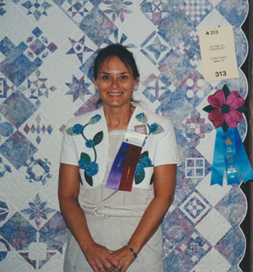 Linda Franz with her variation of the Dear Jane quilt Paducah 2000