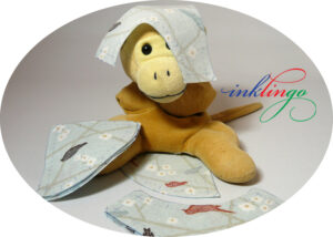 Monkey with drunkard's trail shapes on fabric
