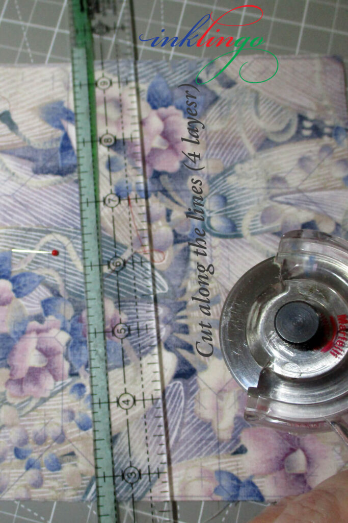 Use a printed sheet of fabric to cut unprinted sheets